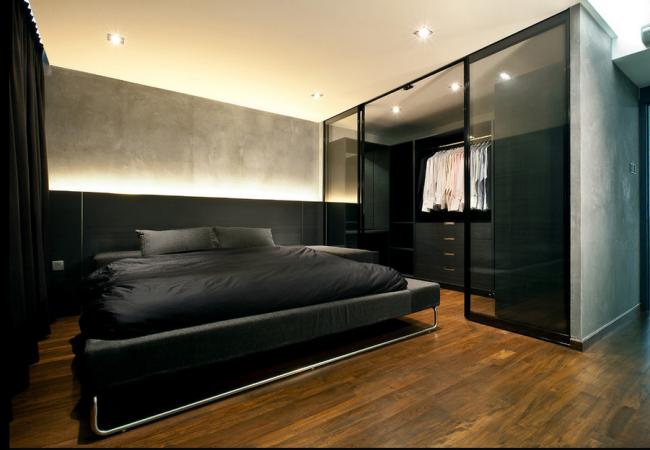 мужской интерьер - аскетичная мужская спальня с гардеробной за стеклом в стиле минимализм